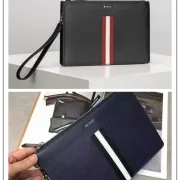 Bally Black Leather Clutch With Signature Stripe For Sophisticated Accessorizing #A51669 Bally Black Leather Clutch With Signature Stripe For Sophisticated Accessorizing #A51669