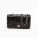 Chanel Classic Flap Bag In Black Patent Leather With Silver Chain Strap And Iconic Logo #A50304