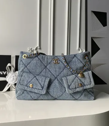 Chanel Women's Denim Tote Bag - Quilted Design, Light Blue Denim Fabric, Gold-Tone CC Logo & Chain Strap with Lock Detail, Spacious Luxury Handbag with Functional Pockets #A56747 Chanel Women's Denim Tote Bag - Quilted Design, Light Blue Denim Fabric, Gold-Tone CC Logo & Chain Strap with Lock Detail, Spacious Luxury Handbag with Functional Pockets #A56747