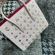 Christian Louboutin Pale Pink Crystal - Studded Handbag With Signature Accents #A52424