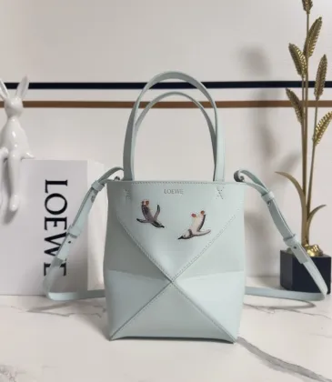 Loewe Women's Mini Bucket Bag - Light Blue Leather with Penguin Embroidery, Convertible Handle & Crossbody Strap, Playful Luxury Handbag with Anagram Logo #A56856 Loewe Women's Mini Bucket Bag - Light Blue Leather with Penguin Embroidery, Convertible Handle & Crossbody Strap, Playful Luxury Handbag with Anagram Logo #A56856